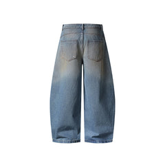Distressed ripped denim trousers