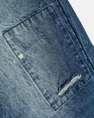 Splatter-painted ripped jeans