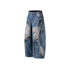Distressed gradient jeans