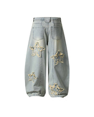 Distressed washed jeans