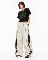 Lace color-blocked striped trousers