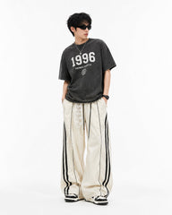 Lace color-blocked striped trousers