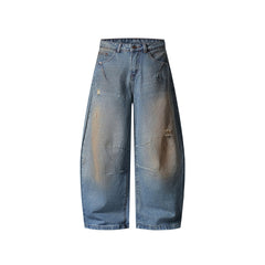 Distressed ripped denim trousers