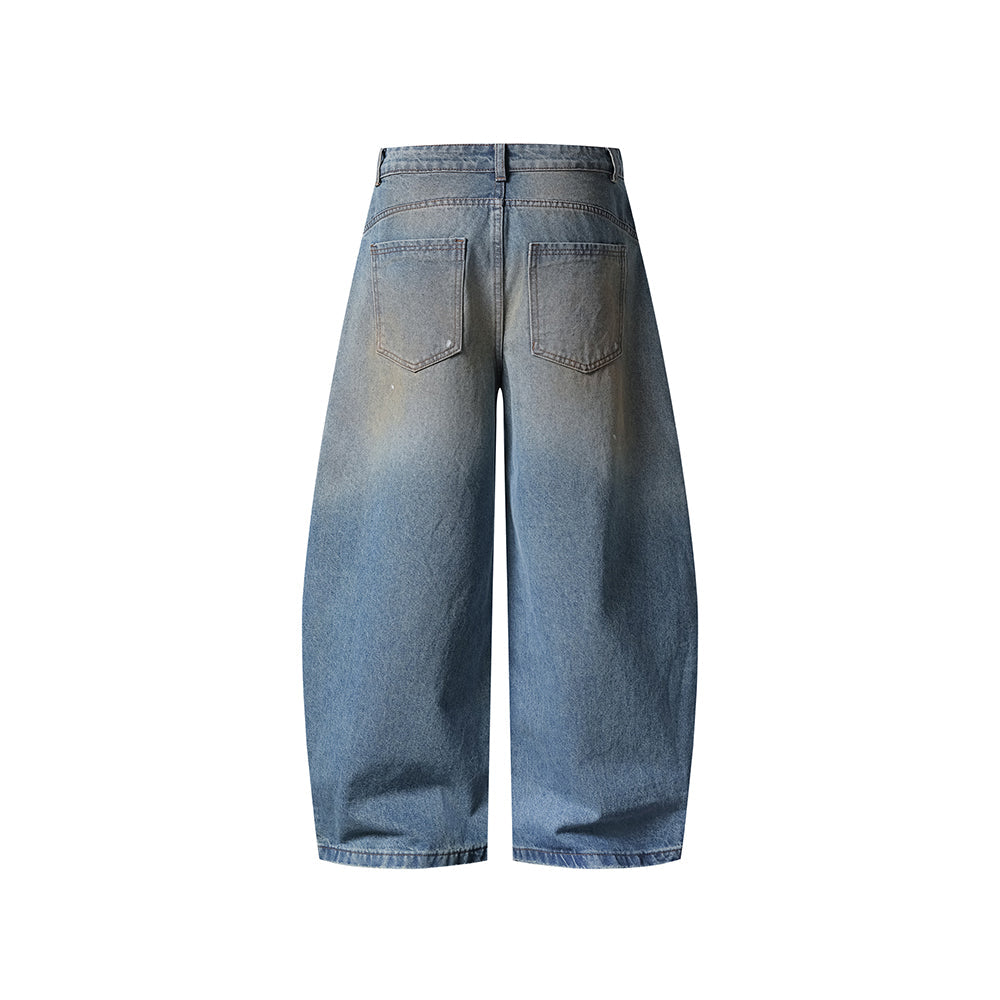 Distressed ripped denim trousers