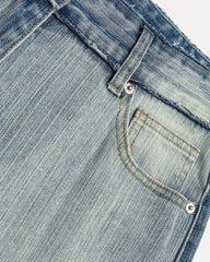 Distressed straight jeans