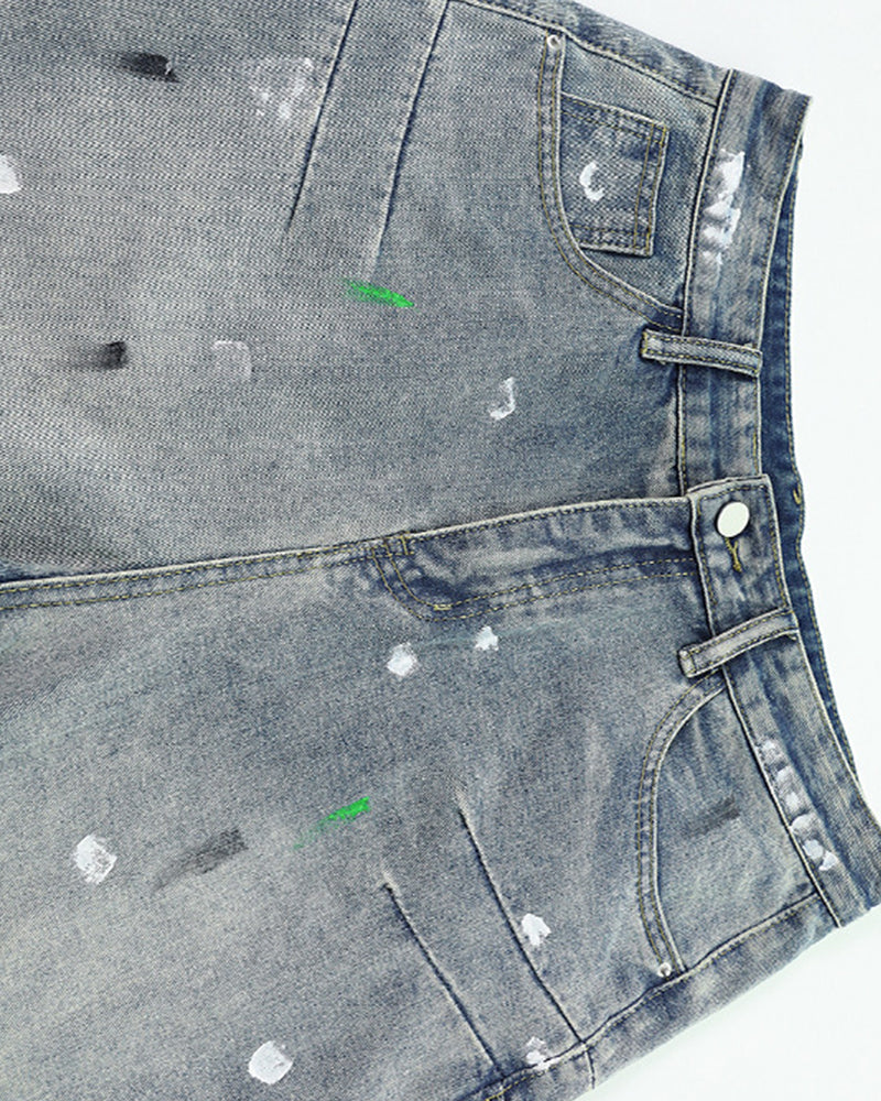 Distressed patchwork jeans