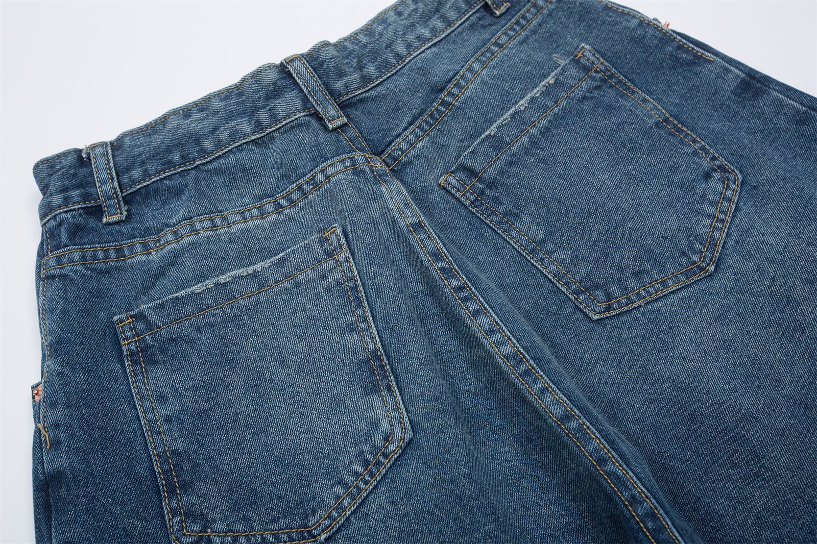 Vintage washed denim trousers