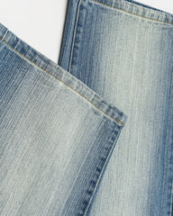 Distressed straight jeans