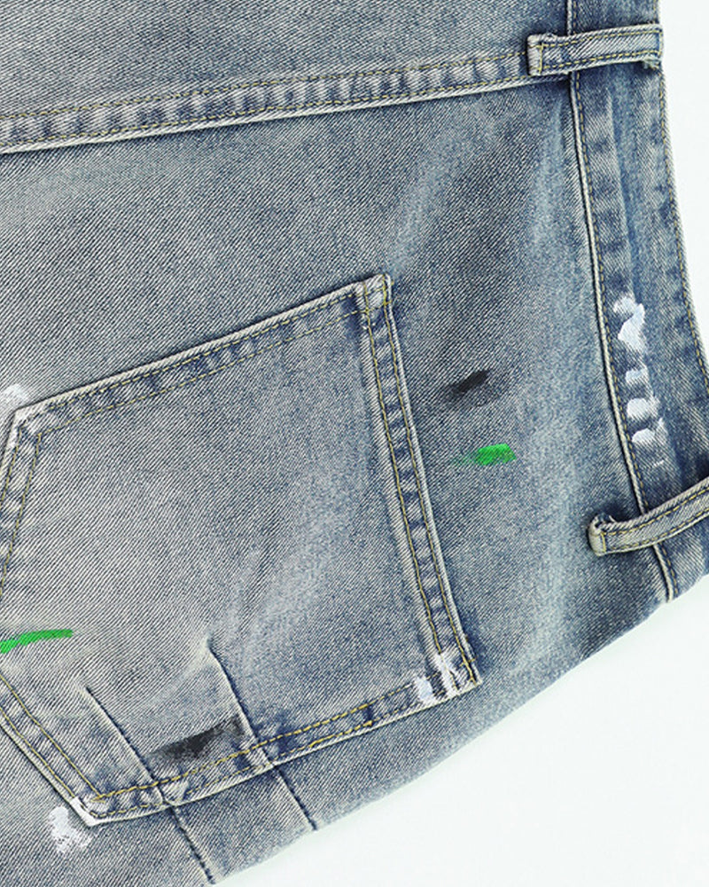 Distressed patchwork jeans