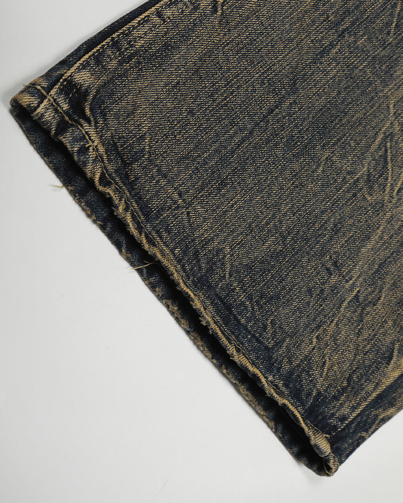 Washed distressed denim trousers