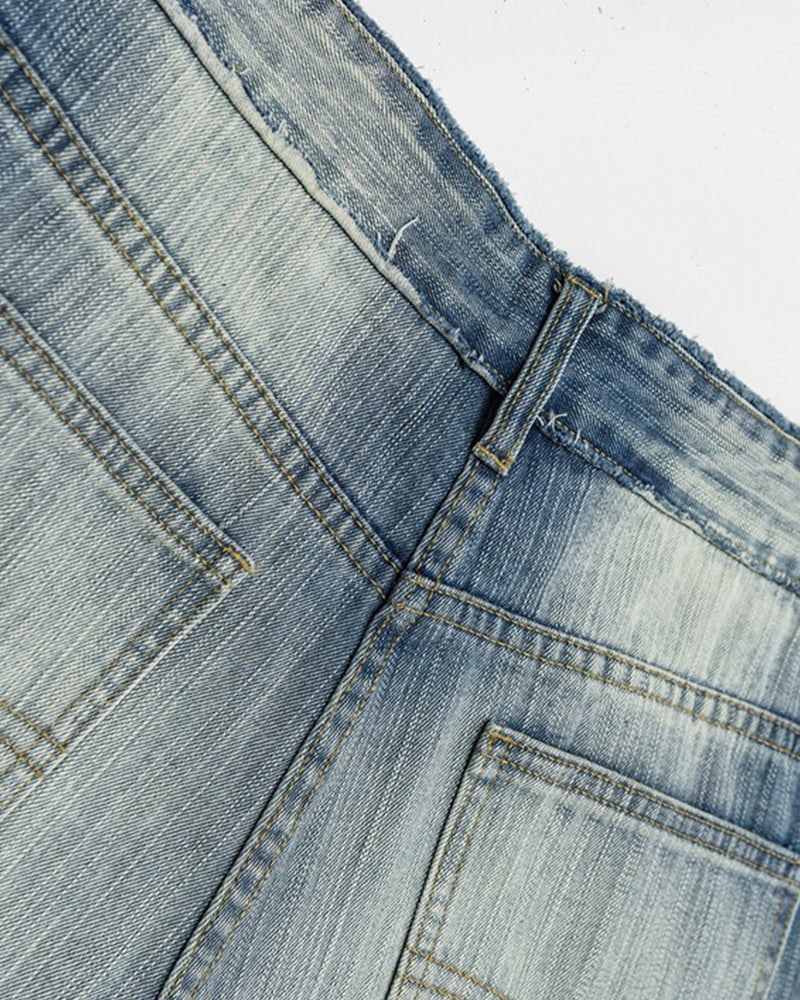 Distressed straight jeans