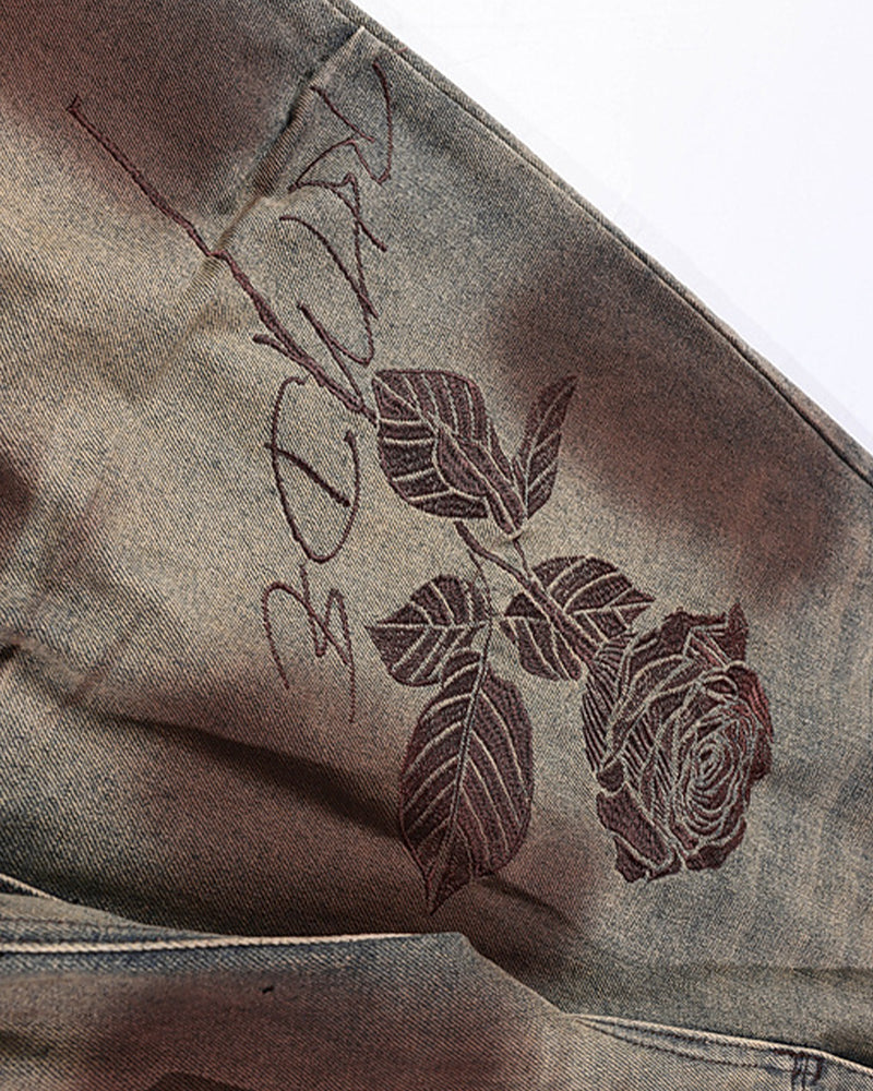 Distressed embroidered jeans