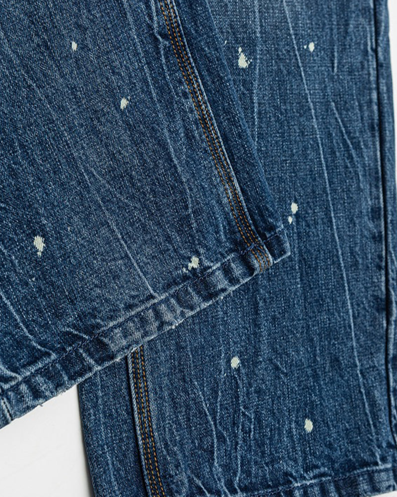 Splatter-painted ripped jeans