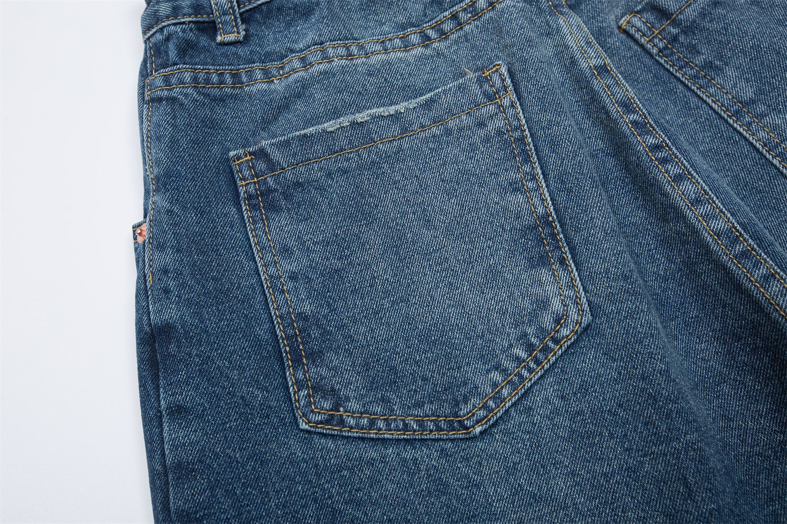 Vintage washed denim trousers
