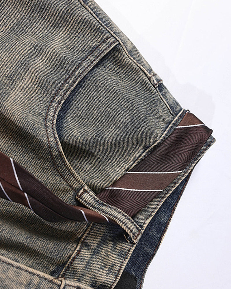 Distressed embroidered jeans
