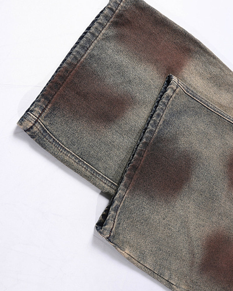 Distressed embroidered jeans