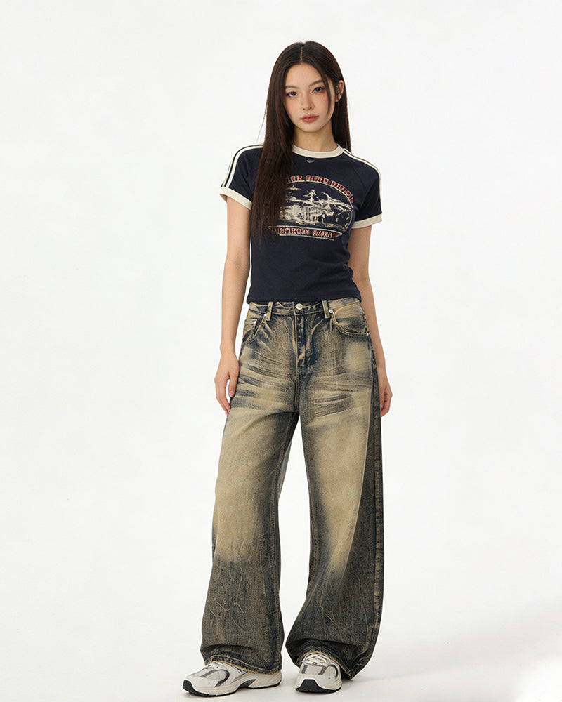 Washed distressed denim trousers