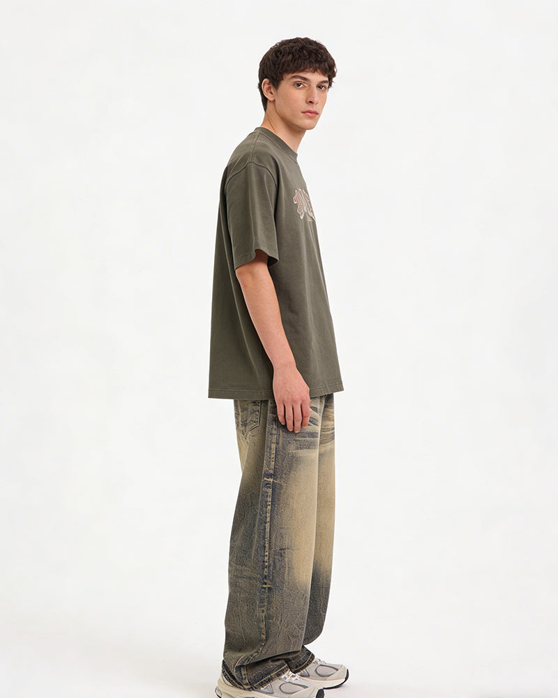 Washed distressed denim trousers