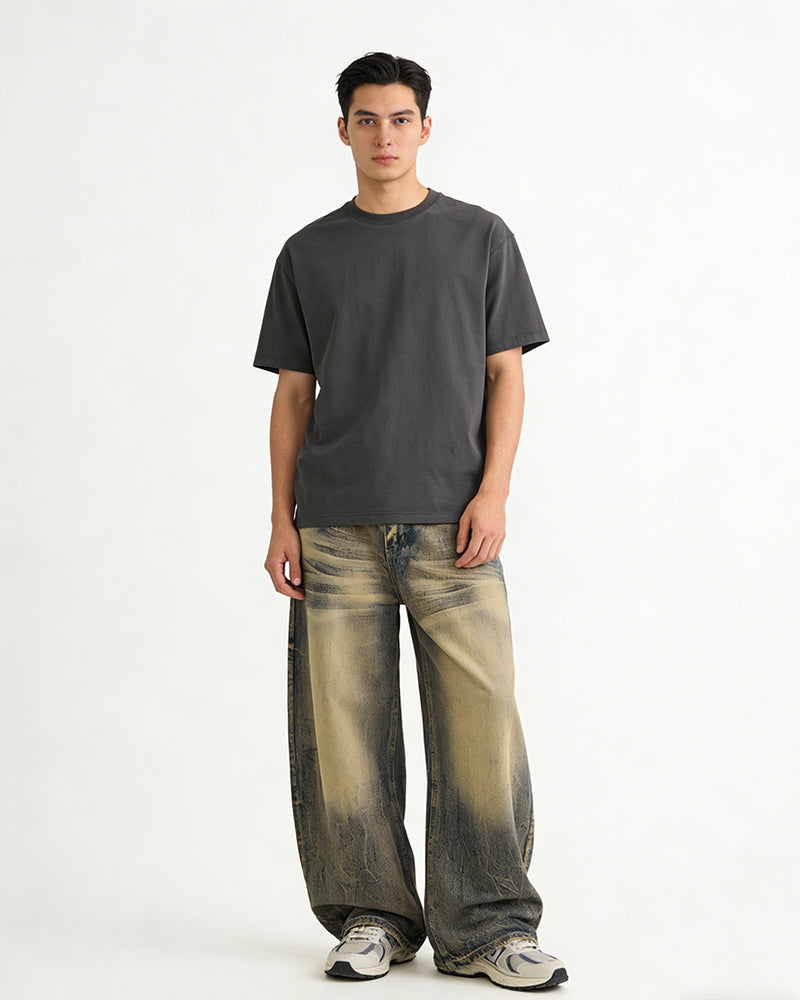 Washed distressed denim trousers