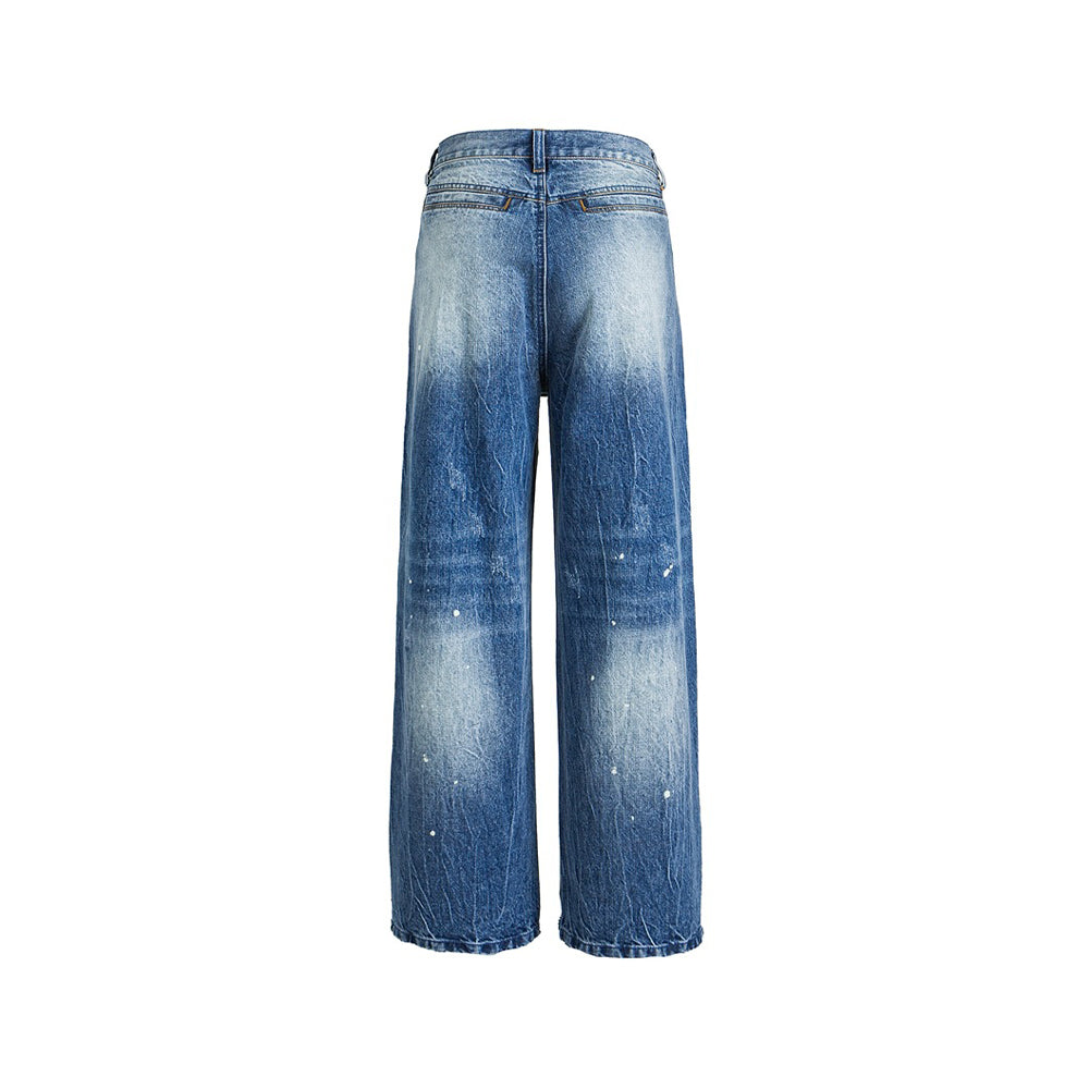 Splatter-painted ripped jeans