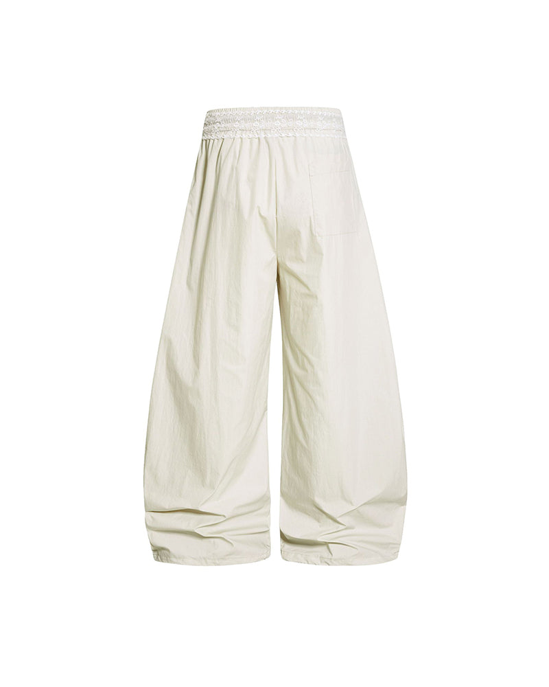 Lace color-blocked striped trousers