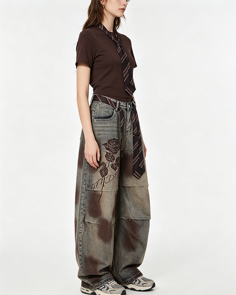 Distressed embroidered jeans
