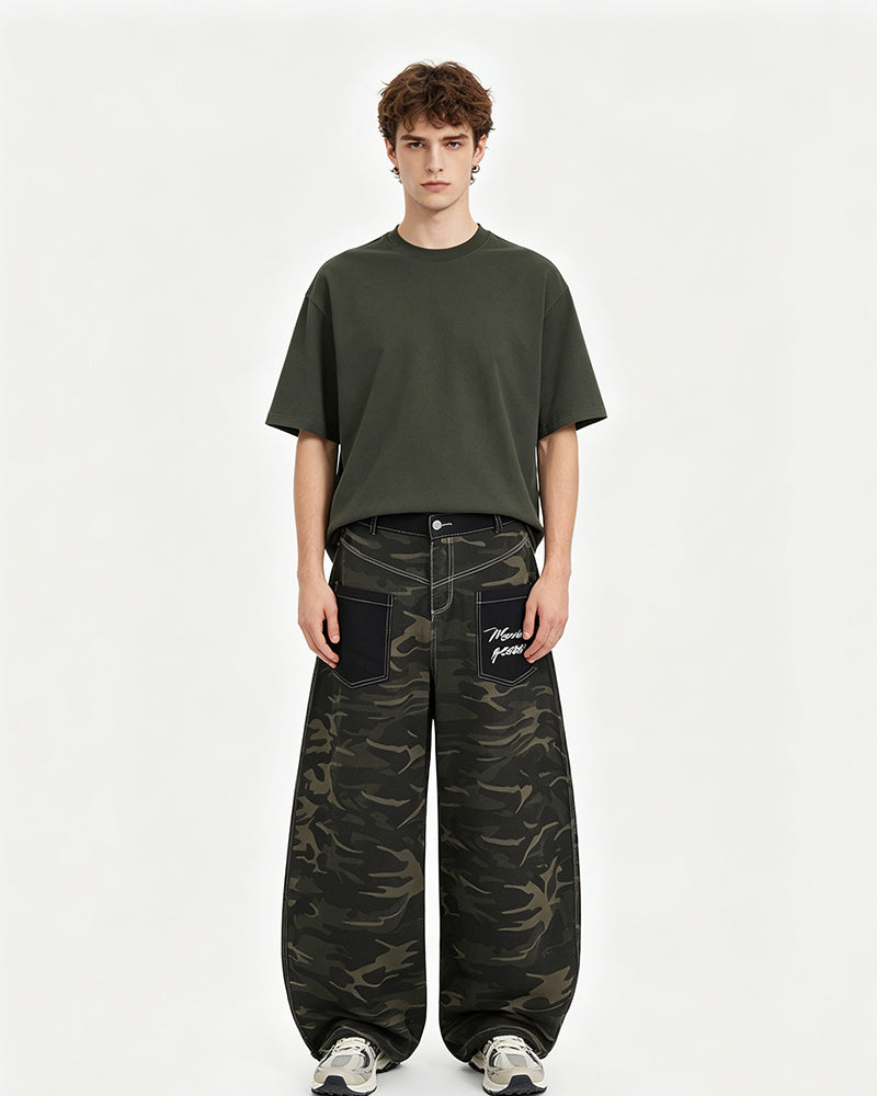 Distressed patchwork camouflage trousers