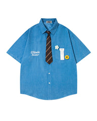 Short-sleeved shirt with small embroidered flowers