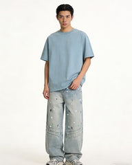 Distressed patchwork jeans