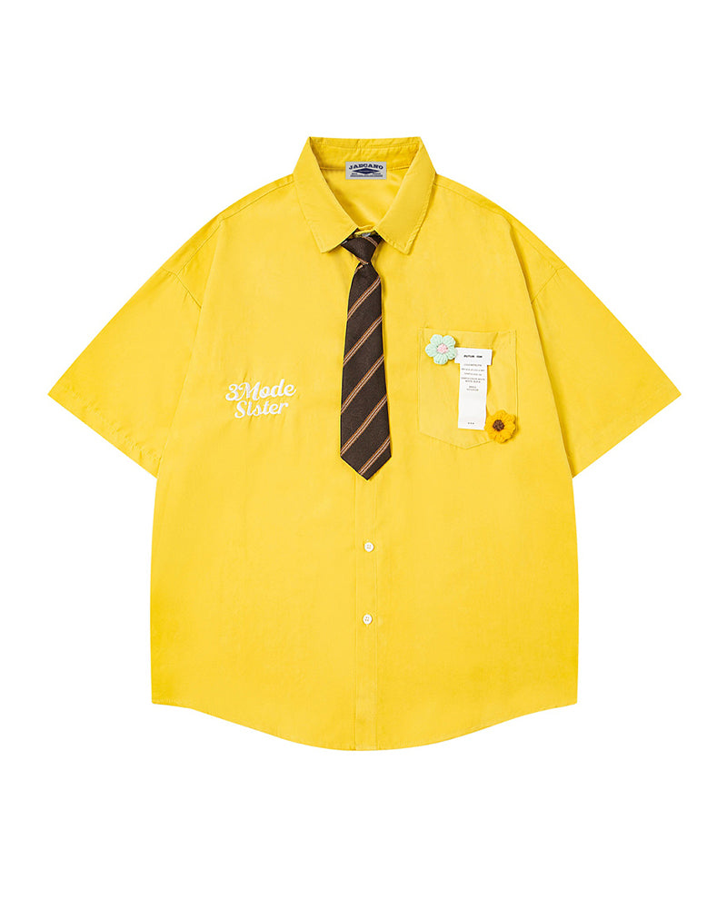Short-sleeved shirt with small embroidered flowers