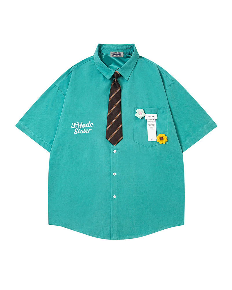 Short-sleeved shirt with small embroidered flowers