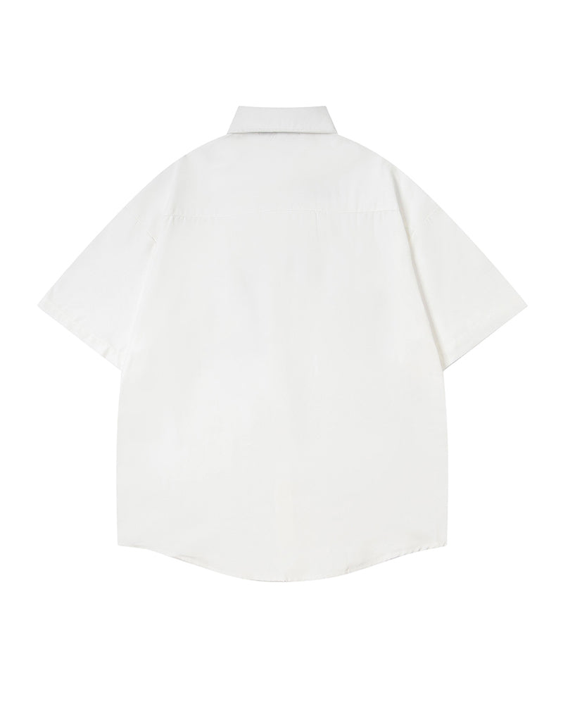 Short-sleeved shirt with small embroidered flowers