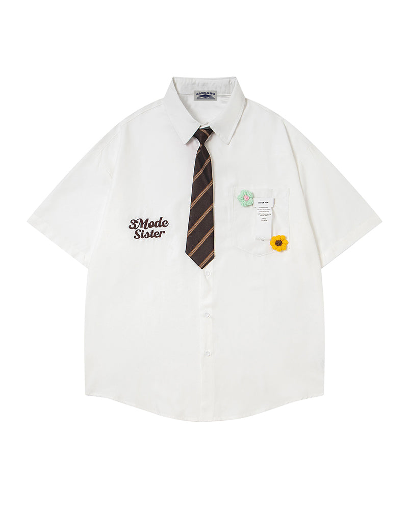 Short-sleeved shirt with small embroidered flowers