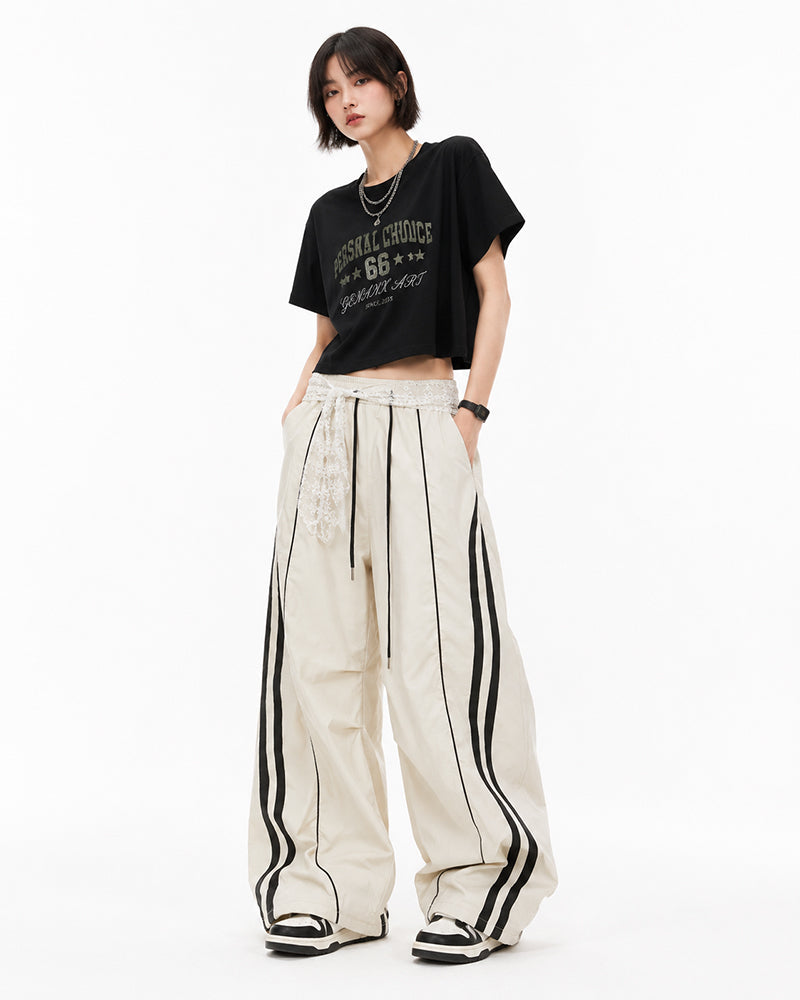 Lace color-blocked striped trousers